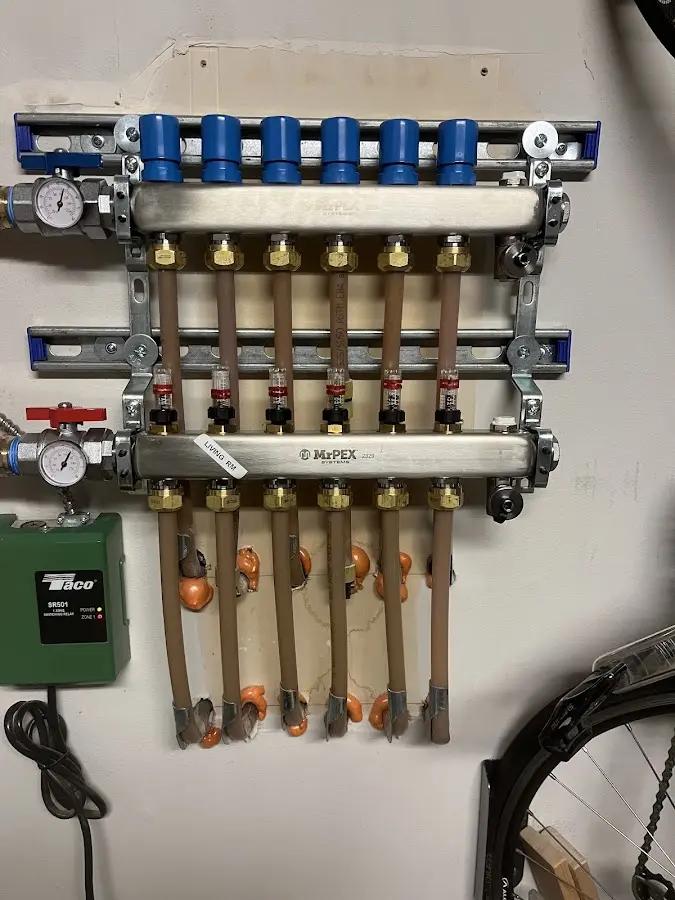 Plumber performing Water Heater Repair at a residential property in Sumter